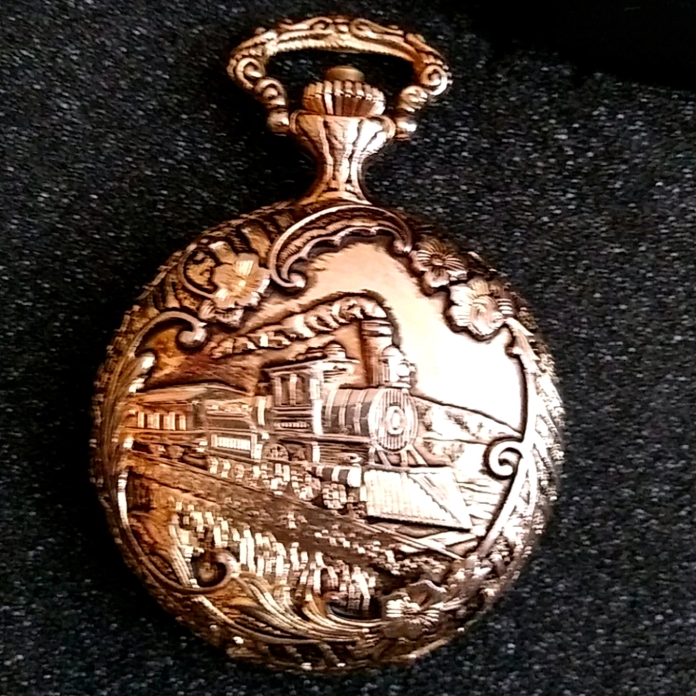 Gold train pocket watch